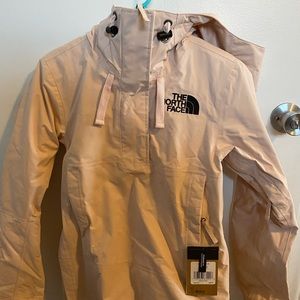 Women’s blush pink North Face Tanager snowboard jacket